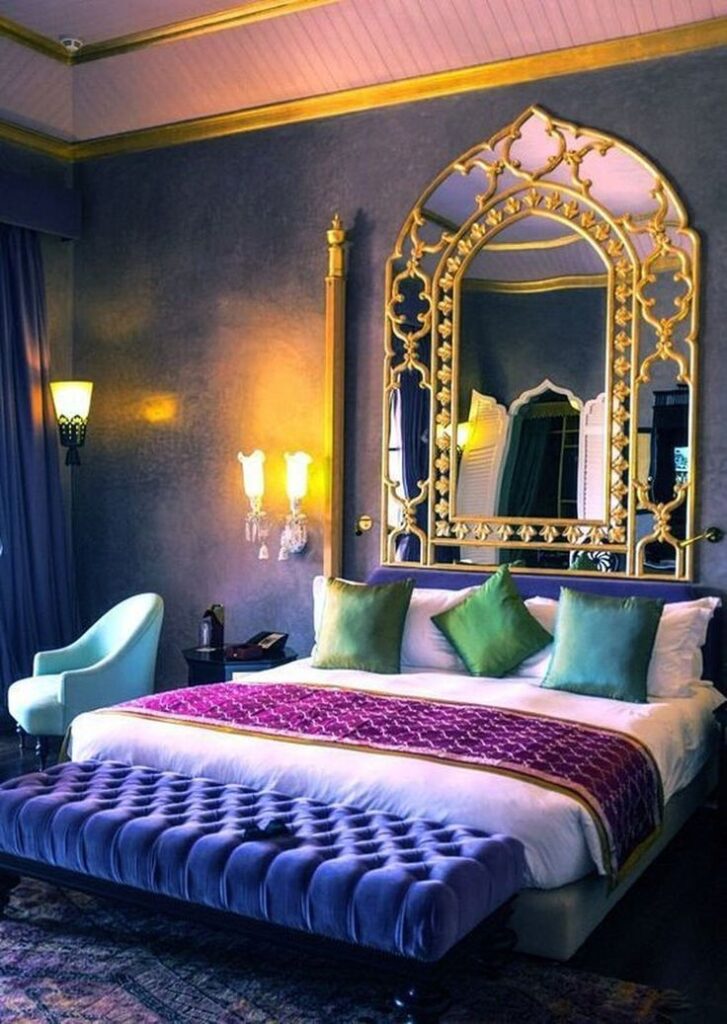 a royal aesthetic bedroom with mirrors, rugs and lamps