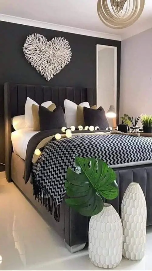 dark grey bedroom with plants
