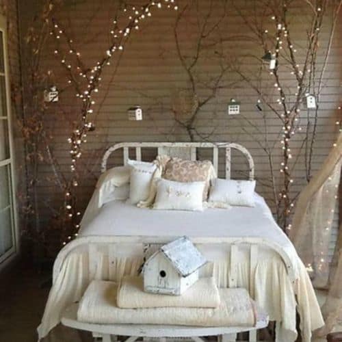 woodland fairy bedroom with branches on both ends of the bed