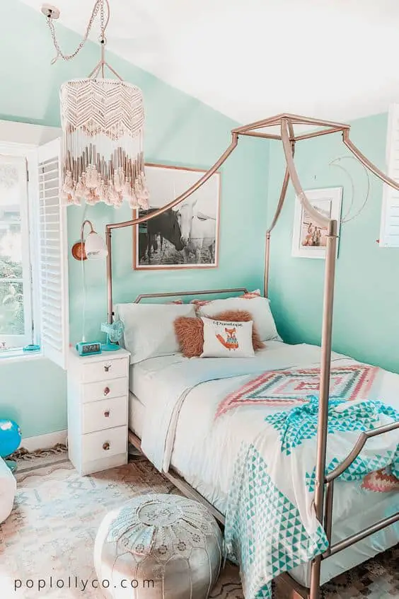 turquoise boho bedroom with canopy bed