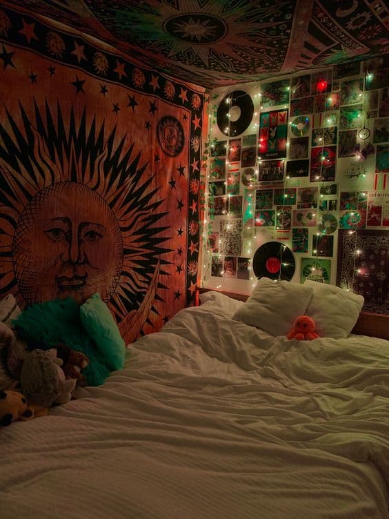 aesthetic bedroom with sun tapestry and fairy lights