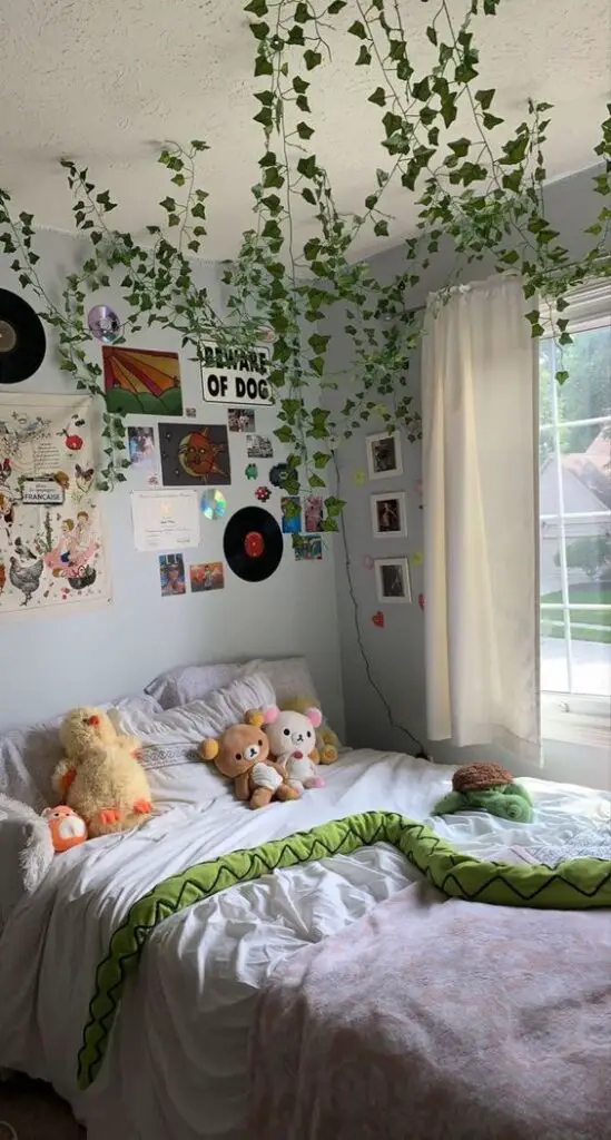 simple white indie room with wall decor and plushies