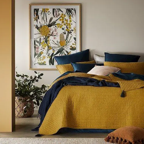 mustard and navy blue bedroom