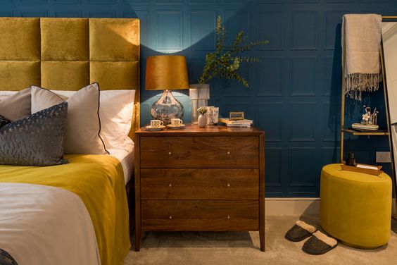 navy blue and mustard bedroom