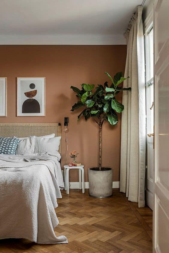 bedroom with terracotta walls