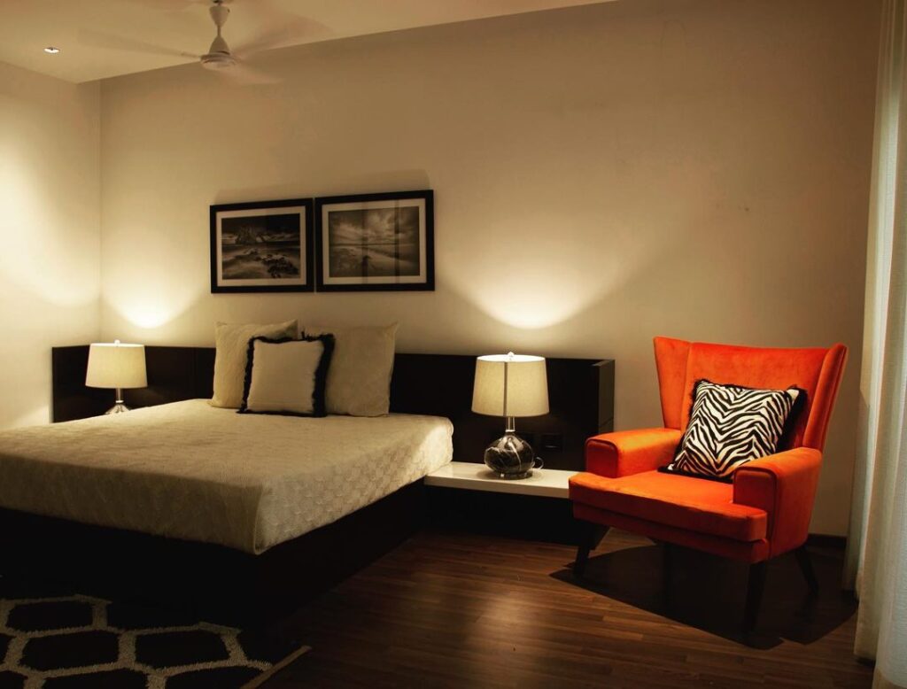 black white and orange bedroom