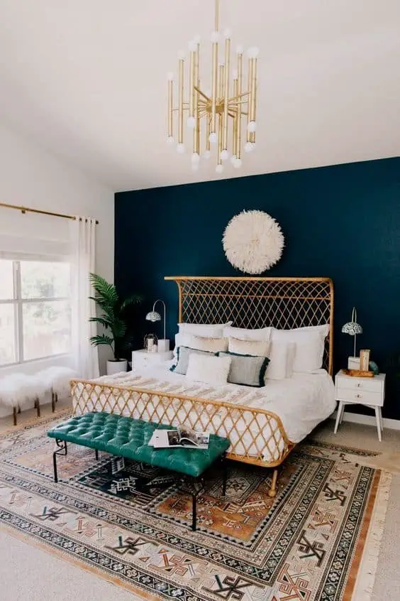 navy blue bedroom with gold accents