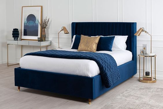white navy blue and golden bedroom