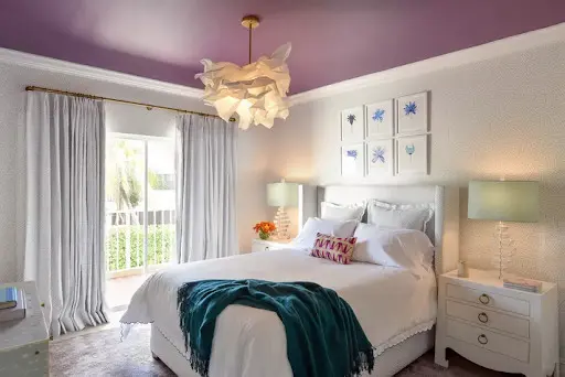white bedroom with mauve ceiling