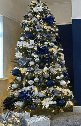 Christmas tree with blue and gold decor