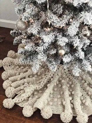 Christmas tree decor with gold skirt