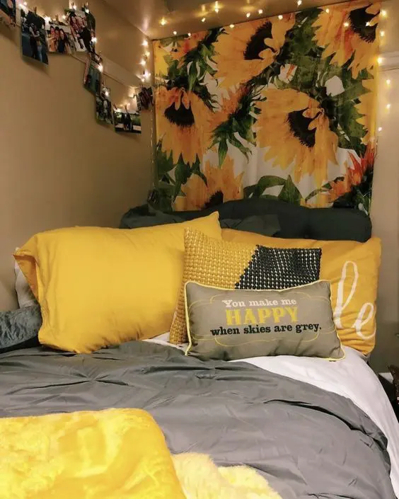 bedroom with yellow color and sunflower tapestry