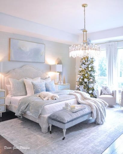 light blue bedroom with gold decor