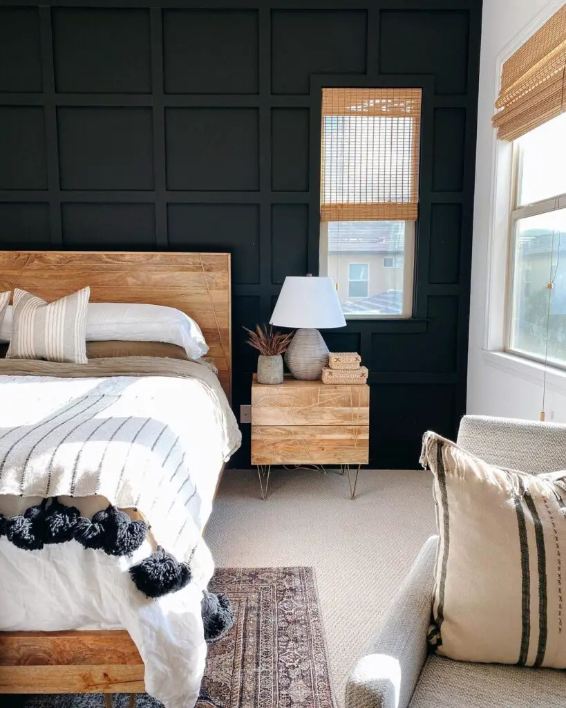 bedroom with black accent wall