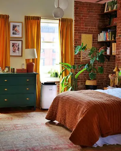 bedroom idea with exposed brick wall