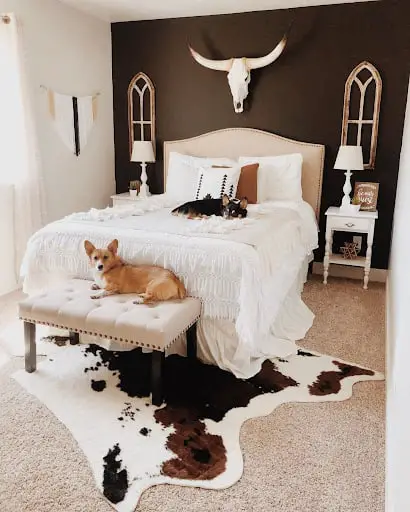 cowboy bedroom with black accent wall