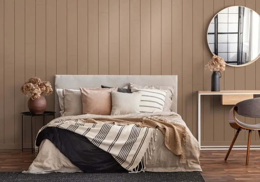 cozy bedroom with brown shiplap wall