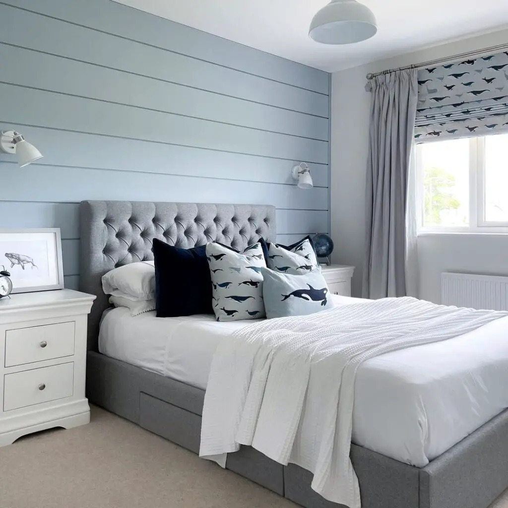 gray bedroom with shiplap wall
