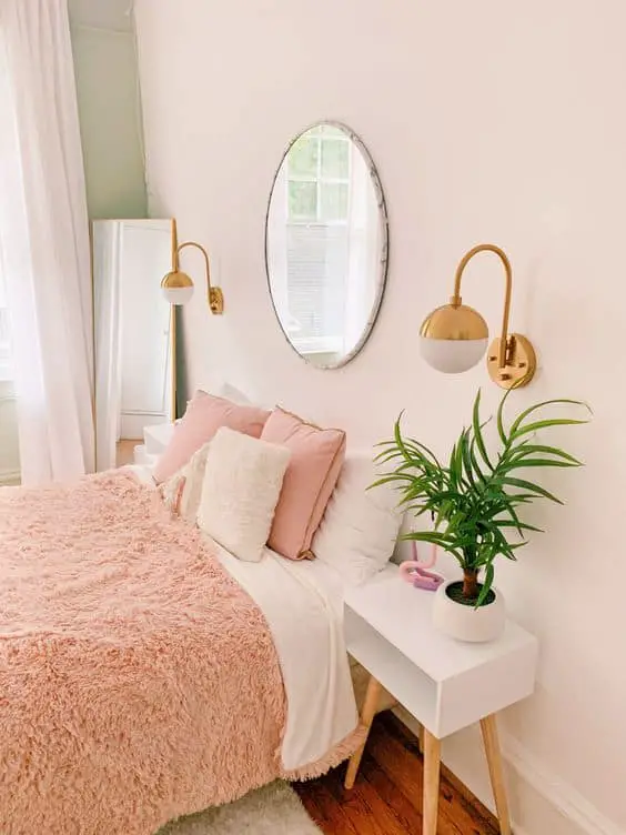 preppy bedroom idea with mirrors and plants
