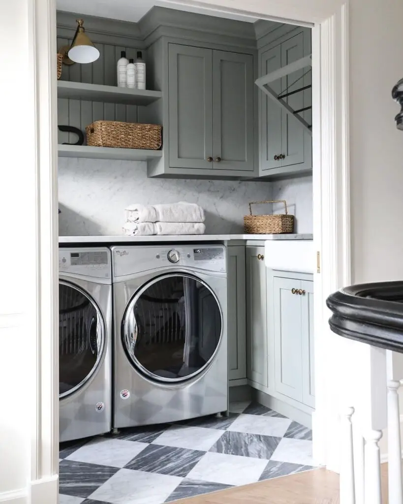 sage green shelving in laundry room