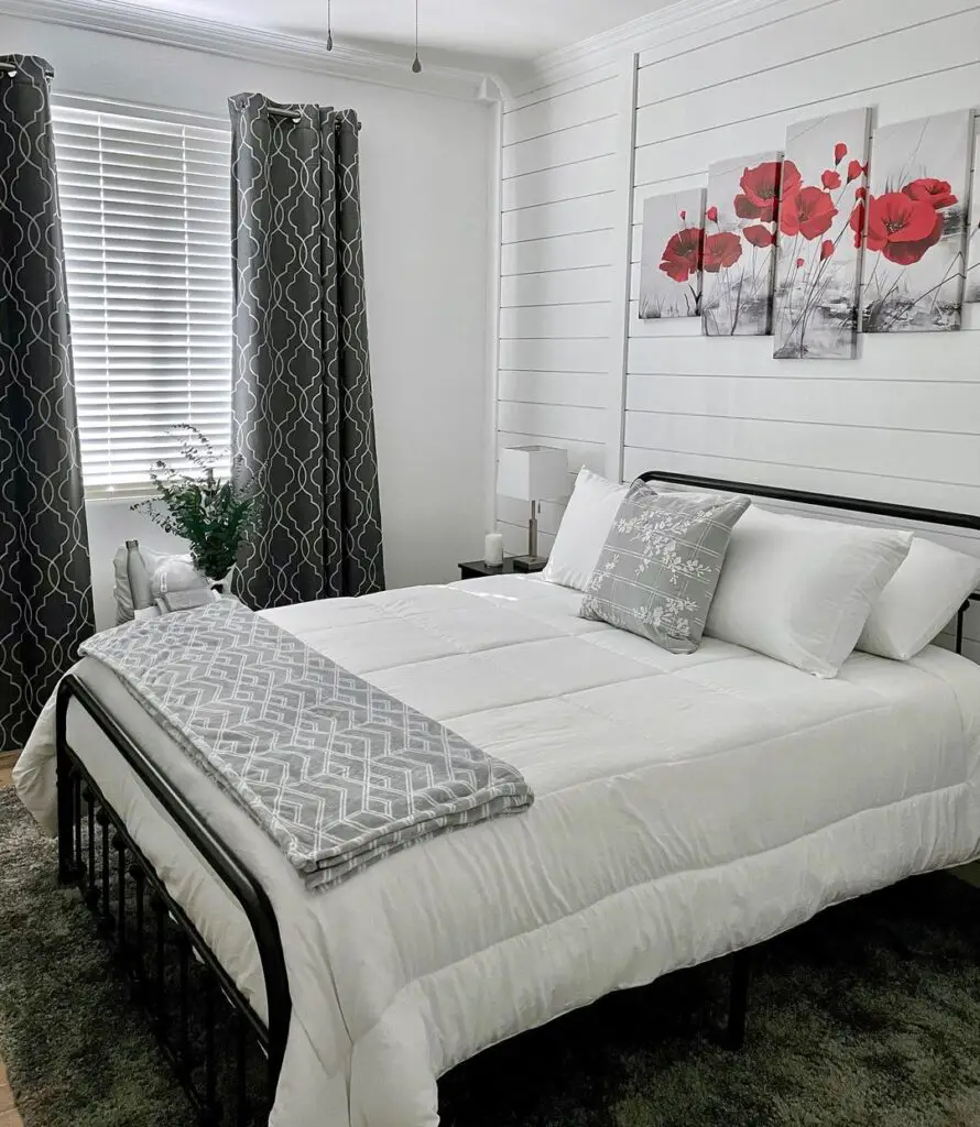 shiplap bedroom design with wall art