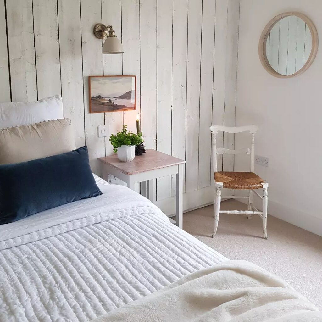 shiplap bedroom wall idea with wooden planks