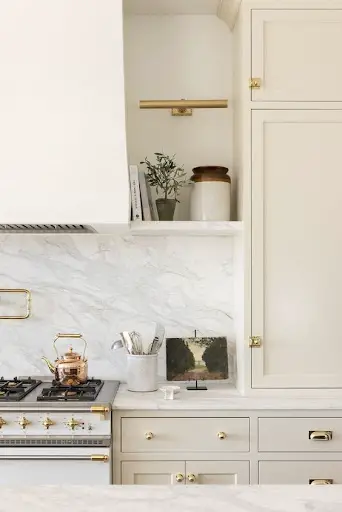 beige and gold kitchen cabinets