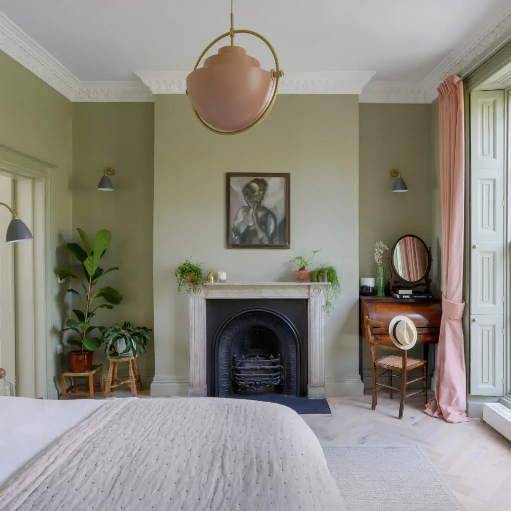 sage green bedroom idea with plants