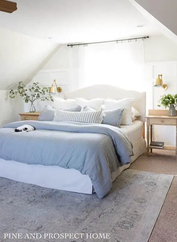 coastal bedroom idea with slanted walls
