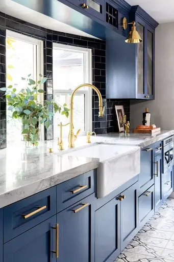 farmhouse blue kitchen cabinets with marble countertops