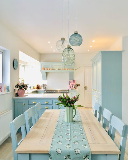 light blue dining room cum kitchen