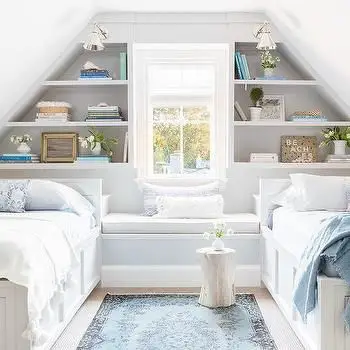 coastal bedroom idea with slanted wall