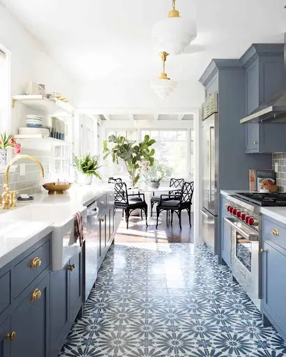 blue kitchen with blue and white mosaic flooring