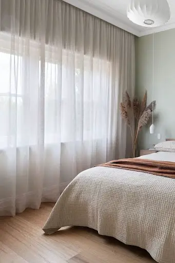 sheer drapes in glam bedroom idea