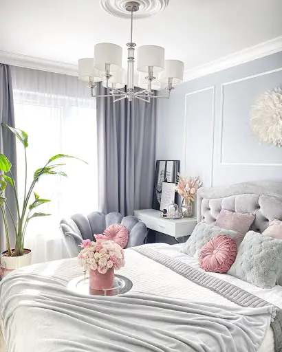 statement chandelier in a glam bedroom