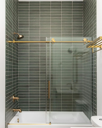 green shower tiling idea