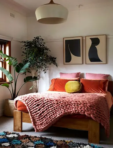 mid-century modern bedroom with plants