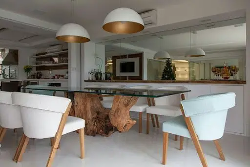coastal dining room idea with glass and acrylic furniture