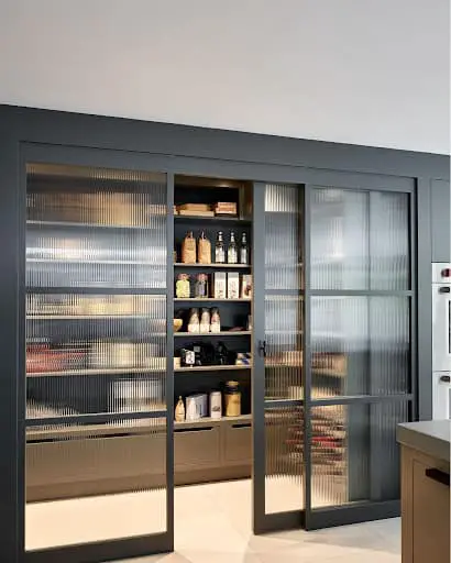 a see-through pantry with glass panels