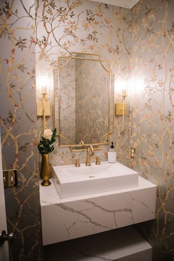 art deco bathroom with matallic accents