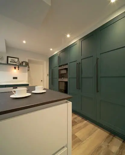 colorblocking walls with floor to ceiling kitchen cabinets