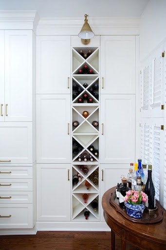 wine rack in floor o ceiling cabinets
