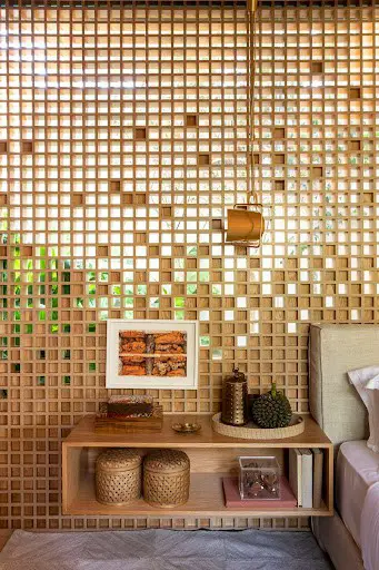 wood accent wall idea with perforations