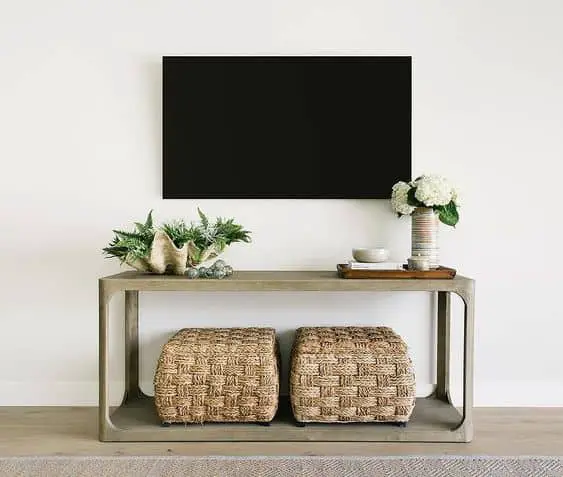tv console decor with tray, flowers and plants