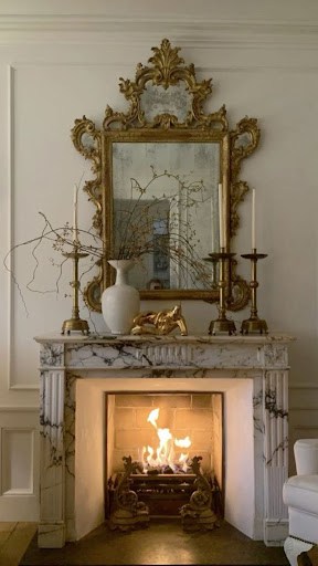 antique accents over the fireplace