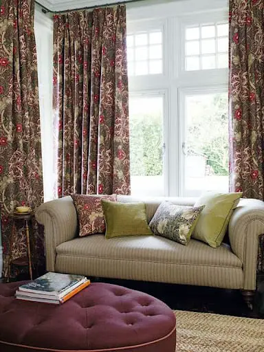 victorian living room idea with patterned curtains