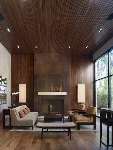 brown living room with wooden wall