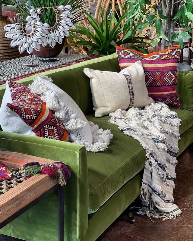 boho living room with green sofa