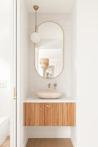 gold accents in powder room vanity