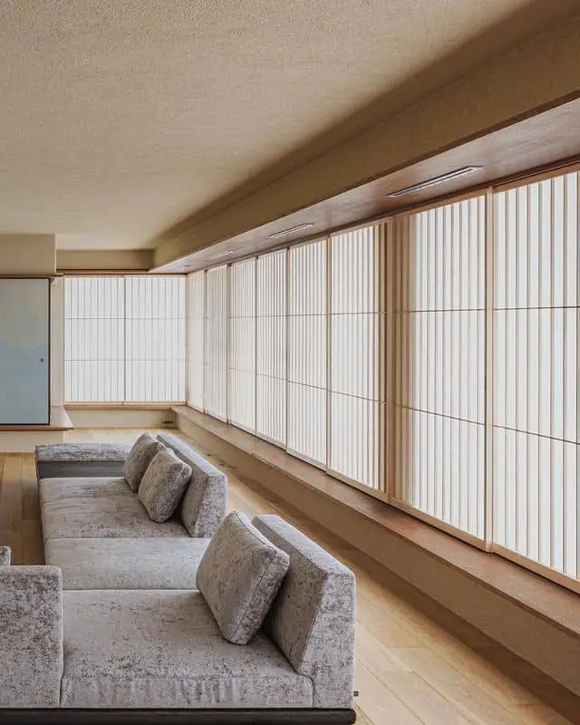 simple japanese living room with large windows